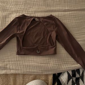 Never worn Lazuli Label gym top.